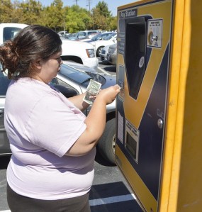 Sign Language major, Elizabeth says "It's not fair," about the increase price for parking at City College. Photo by Emily Foley. 